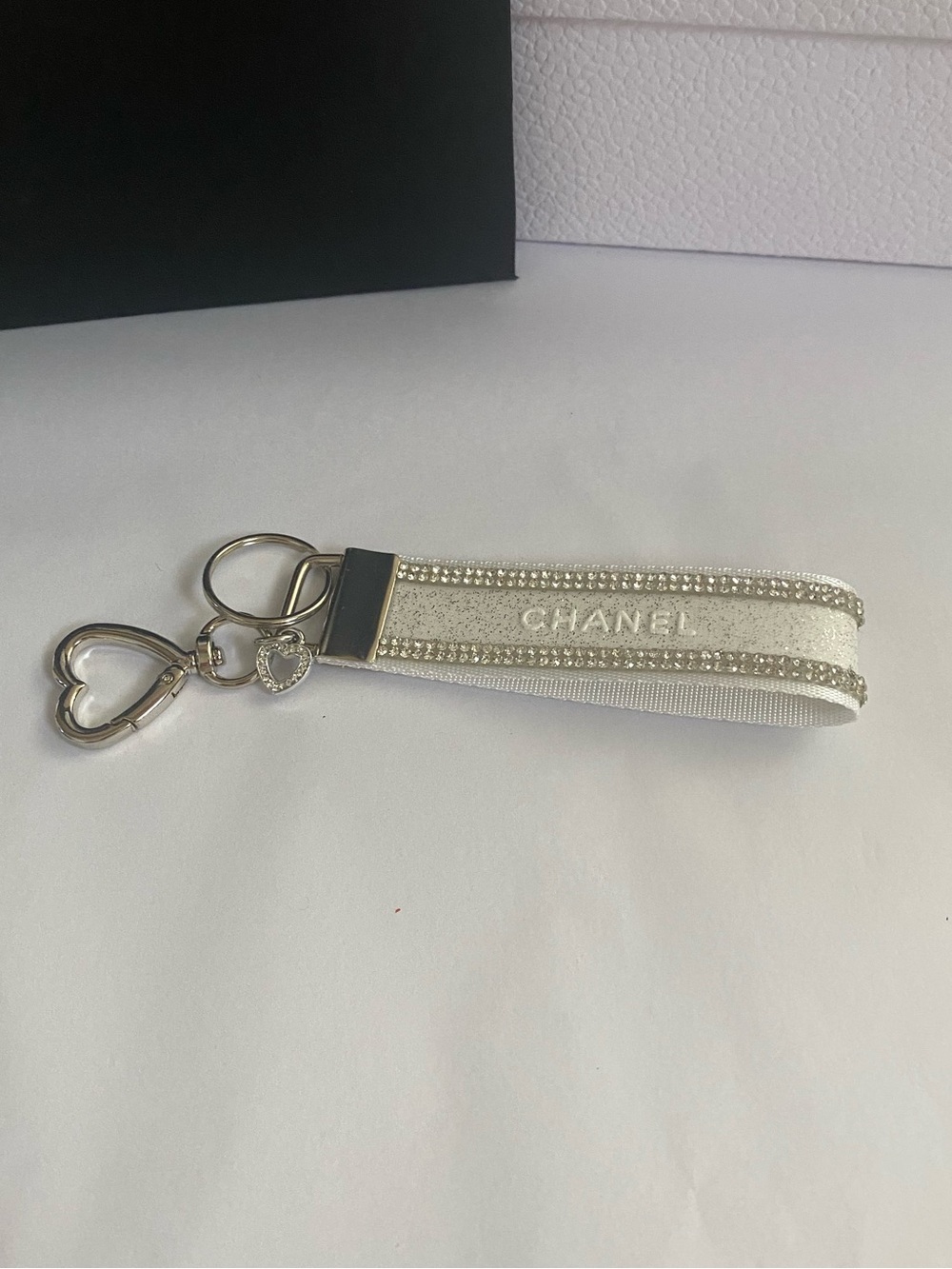Chanel Ribbon White Glitter Keychain